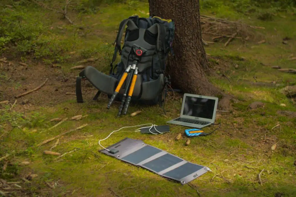 solar panel charging a laptop